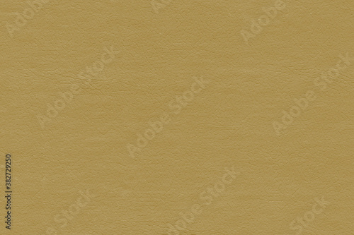 Vintage and old looking paper background. Colored gold with a brown retro book cover. Ancient book page.