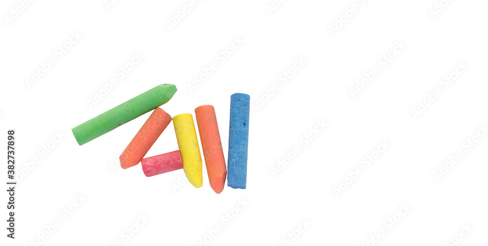 chalks in a variety of colors arranged on a white background