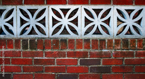 Red brick Wall with Floral Concrete Blocks