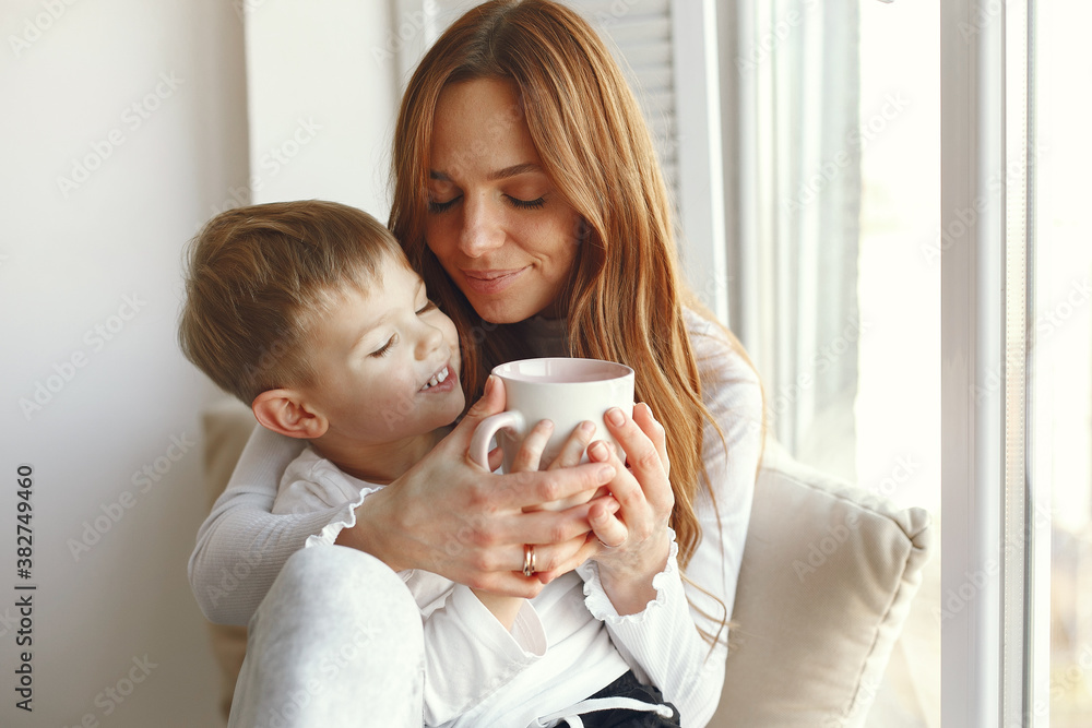 Mother with child. Family at home. People with presents. Mother with child. Family at home. People with presents.