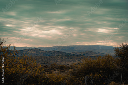 vista de montañas sierras en invierno con cielo nublado © patoouupato