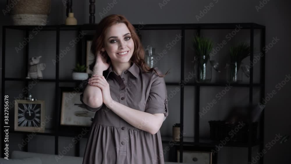 Beautiful young girl twirling in a dress against the background of a beautiful home interior, 4k Beautiful young girl twirling in a dress against the background of a beautiful home interior, 4k