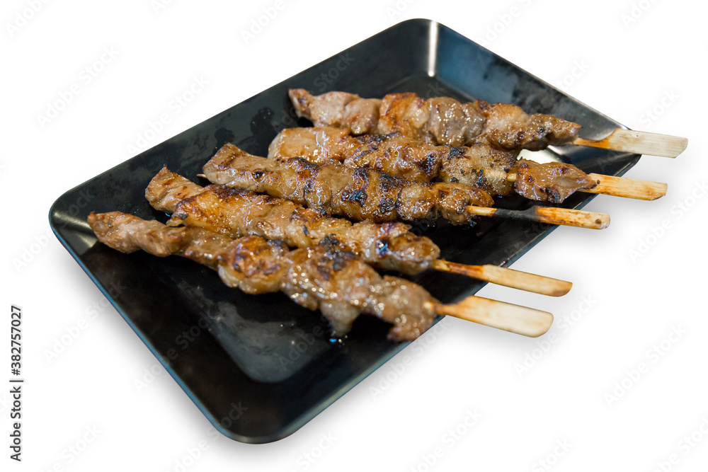 Die cut of Grilled beef on a grilled skewer on white isolated, focus selective.