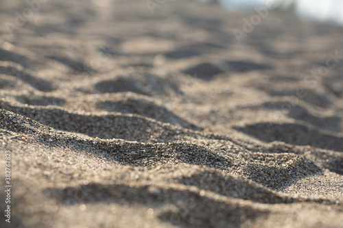 Close up of sea sand forming small dunes  concept of holidays and relaxation1