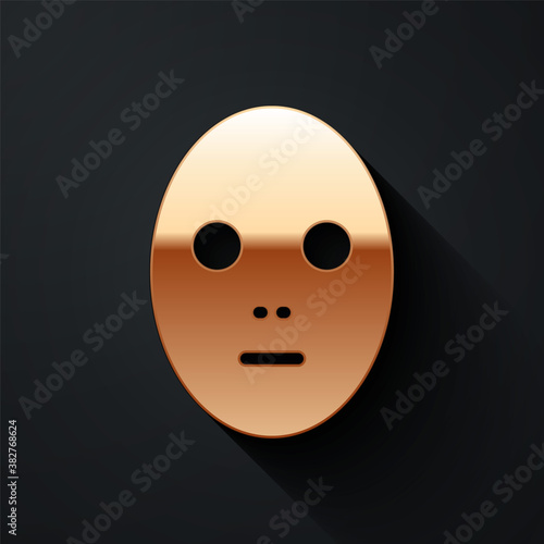 Gold Facial cosmetic mask icon isolated on black background. Cosmetology, medicine and health care. Long shadow style. Vector Illustration.