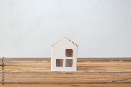 Home protecting insurance concept ,Paper house, family home