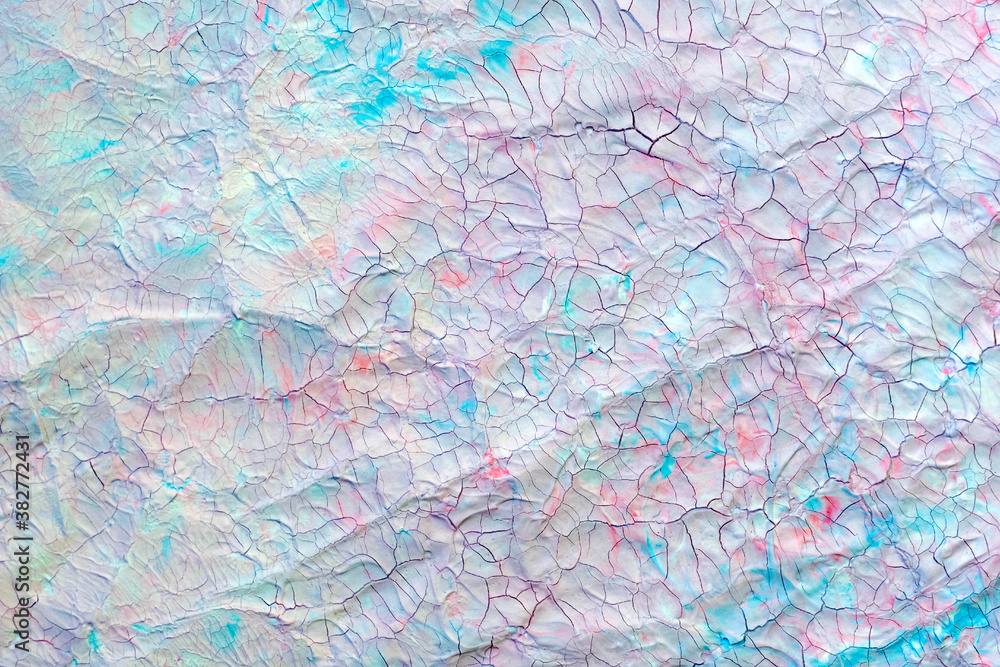 Cracked paint, blues and pinks, craquelures. Painted old background
