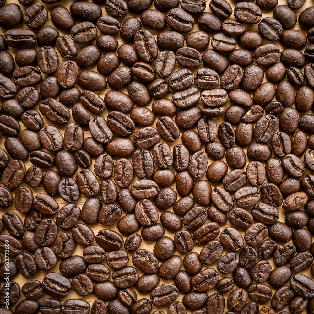 Naklejka premium Close up of roasted coffee beans background