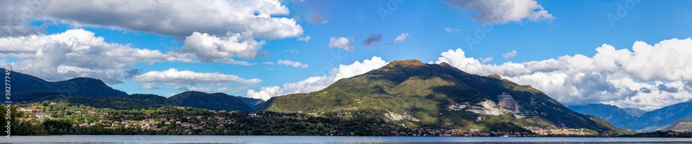 mountain landscape with blue sky and clouds, panorama