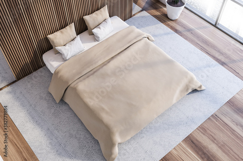 Modern white and dark wooden master bedroom, top view