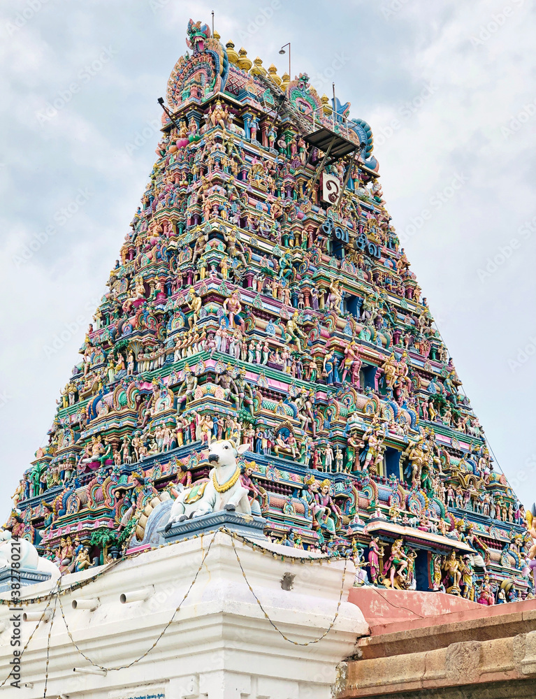 Ancient Hindu temple with beautiful God sculptures in the tower of Kapaleeshwarar temple in Tamil nadu. 