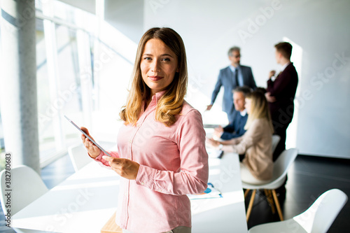 Young business woman using ...