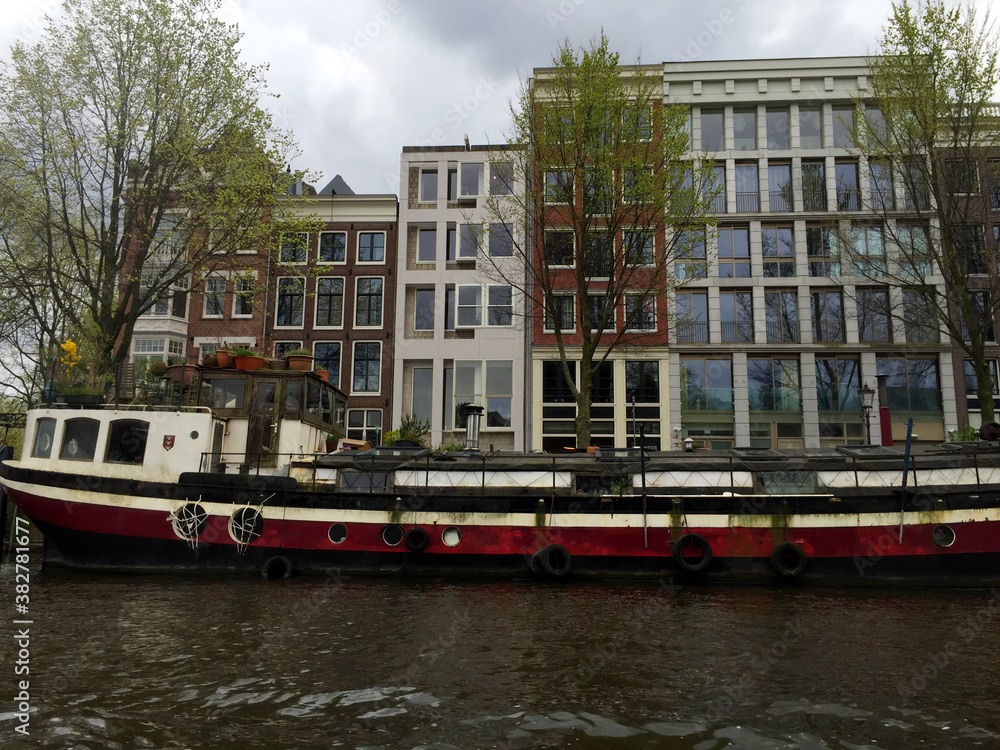 Naklejka premium landscape of canals of Amsterdam in the country, North Holland, Netherlands