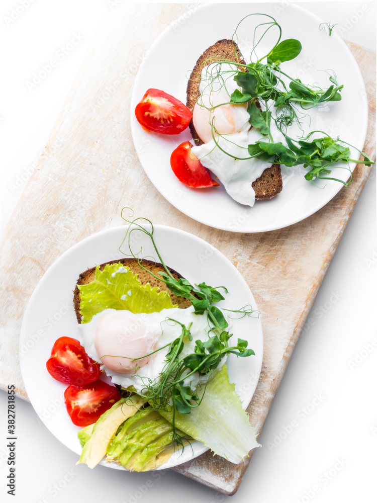 Top view of healthy breakfast with poached eggs