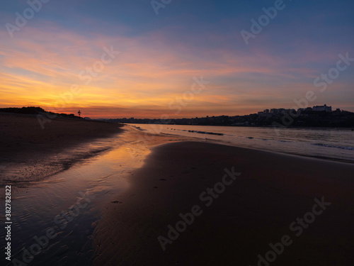 Sunset on the beach of the bay in Santander