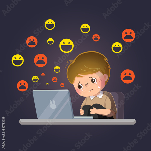 Vector illustration cartoon of sad boy victim of cyberbullying online in front of his laptop.