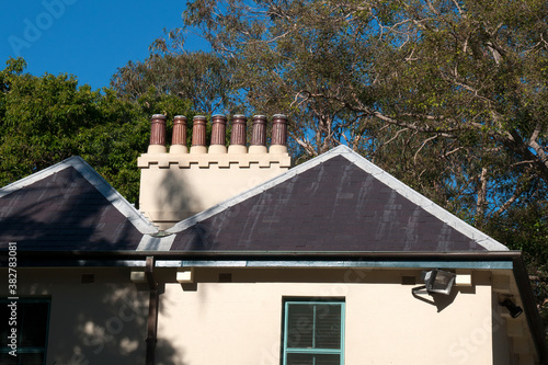 Photography Sydney Australia, roof of historic cottage with chimney pots