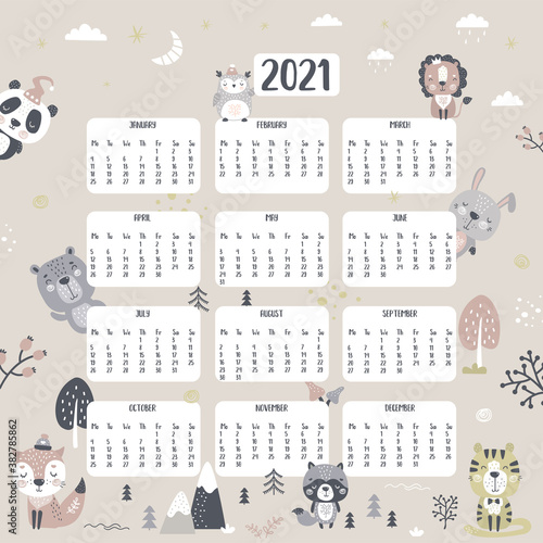 Calendar 2021 with various doodle wild animals and plants. Monthly calendar in scandinavian style