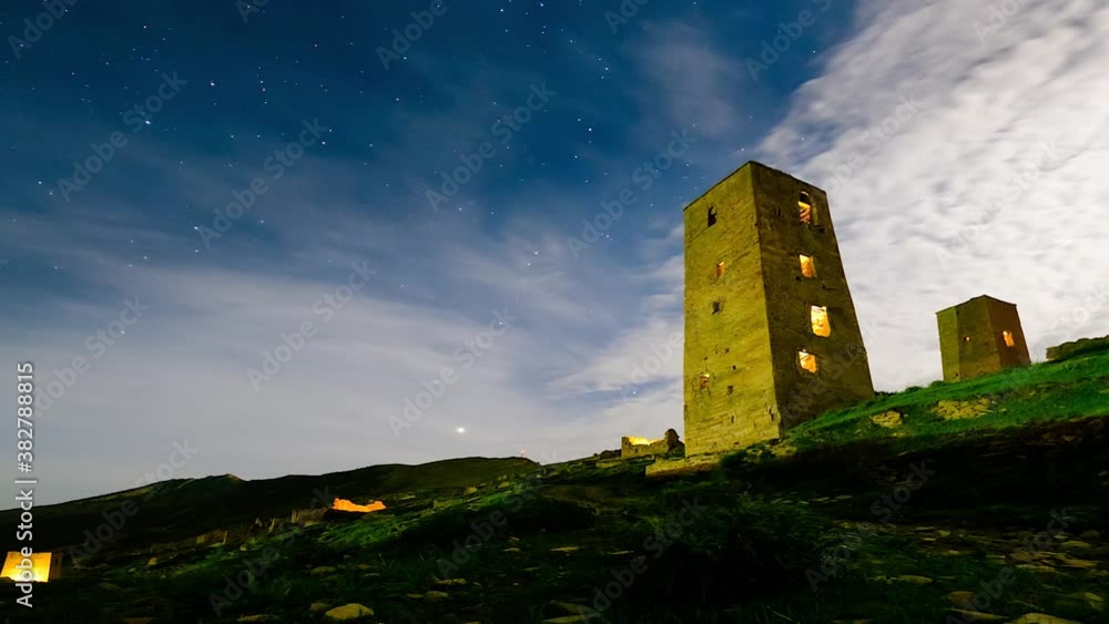 Moonrise over ancient towers timelapse Moonrise over ancient towers timelapse