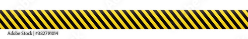 Barrier tape. Construction border. Black and yellow restriction line. Do not cross boundary tape.