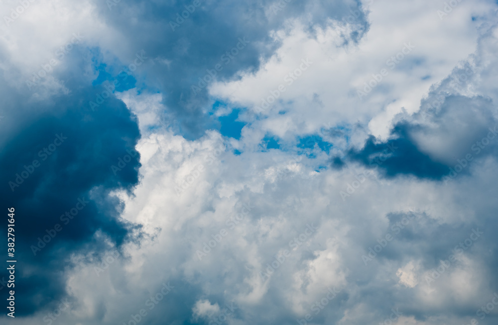 Gray and white clouds in the sky, background Gray and white clouds in the sky, background