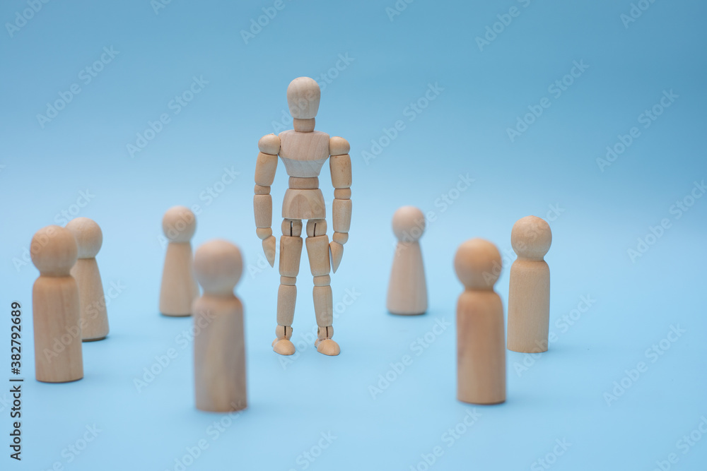 Successful team leader, Wooden people standing out from the other. Successful team leader, Wooden people standing out from the other.