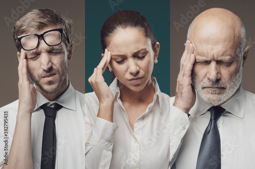 Business people suffering with headache