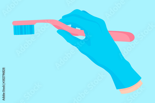 Vector cartoon hand of a dentist in a blue glove that hold a dental instrument: manual toothbrush for oral care.