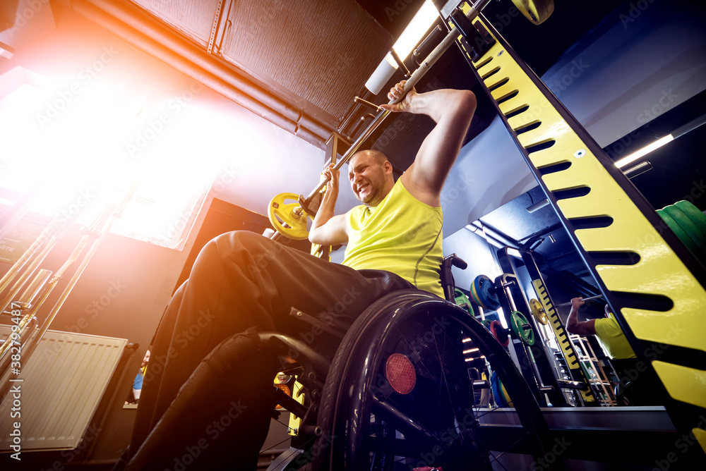 Naklejka premium Disabled man training in the gym of rehabilitation center