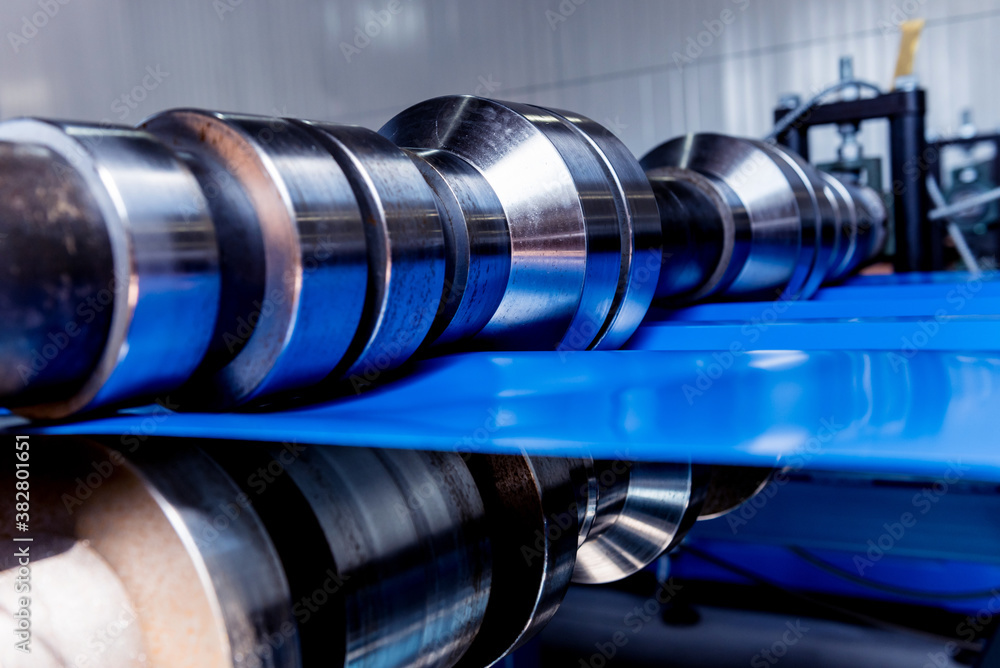 Metal sheet forming machine at the modern metalwork factory. Metal sheet forming machine at the modern metalwork factory.