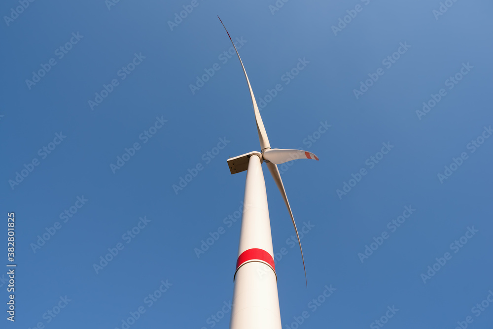 Wind turbines on sky background. Environment and renewable energy. Green energy