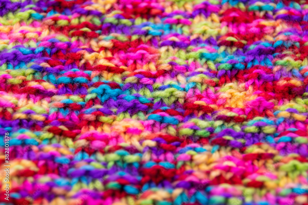 The structure of a colorful knitted scarf