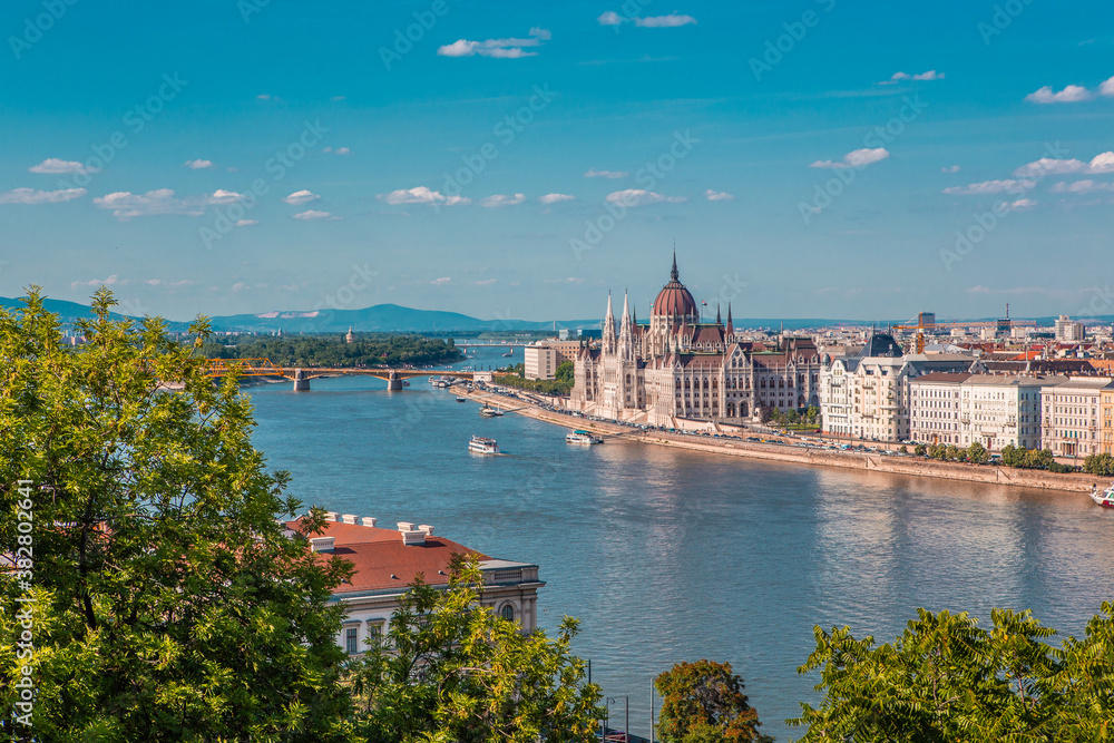 Obraz premium The Parliament building of Hungary in Budapest, along the Danube river.