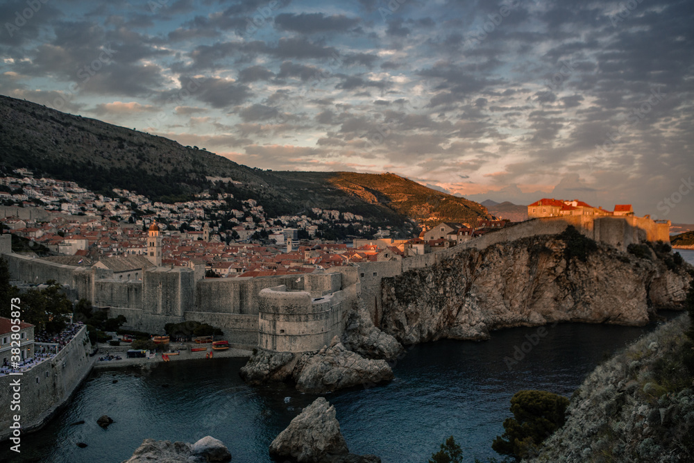 Sunset view of the old town and fortress in Dubrovnik, Croatia.