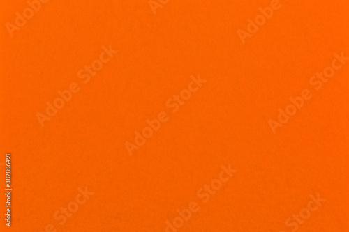 Texture of orange cellulose fabric as a background.