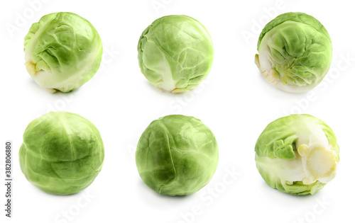 Set of fresh Brussels sprouts on white background
