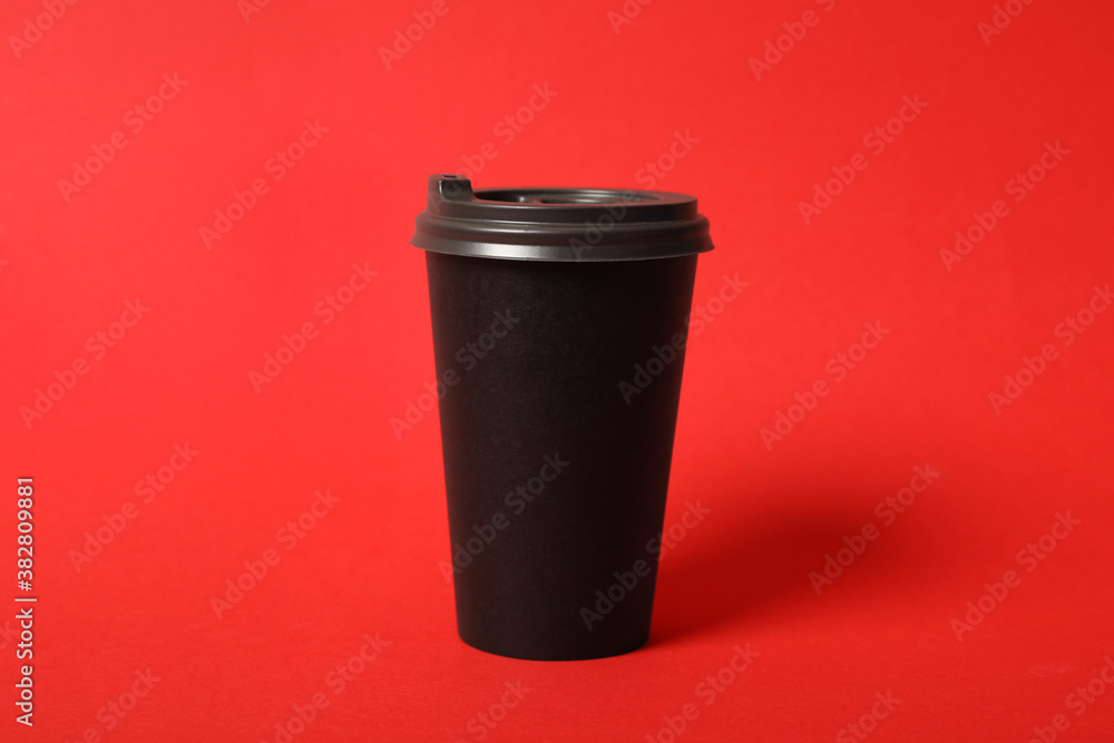 Takeaway paper coffee cup on red background Takeaway paper coffee cup on red background