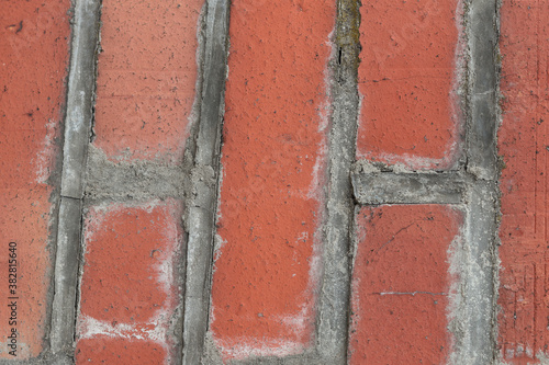 detail of an old red brick wall as a background