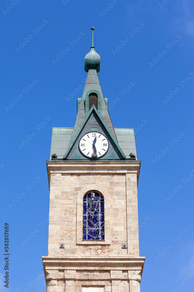 Jaffa Clock tower on a beautiful clear day with blue sky in the background.