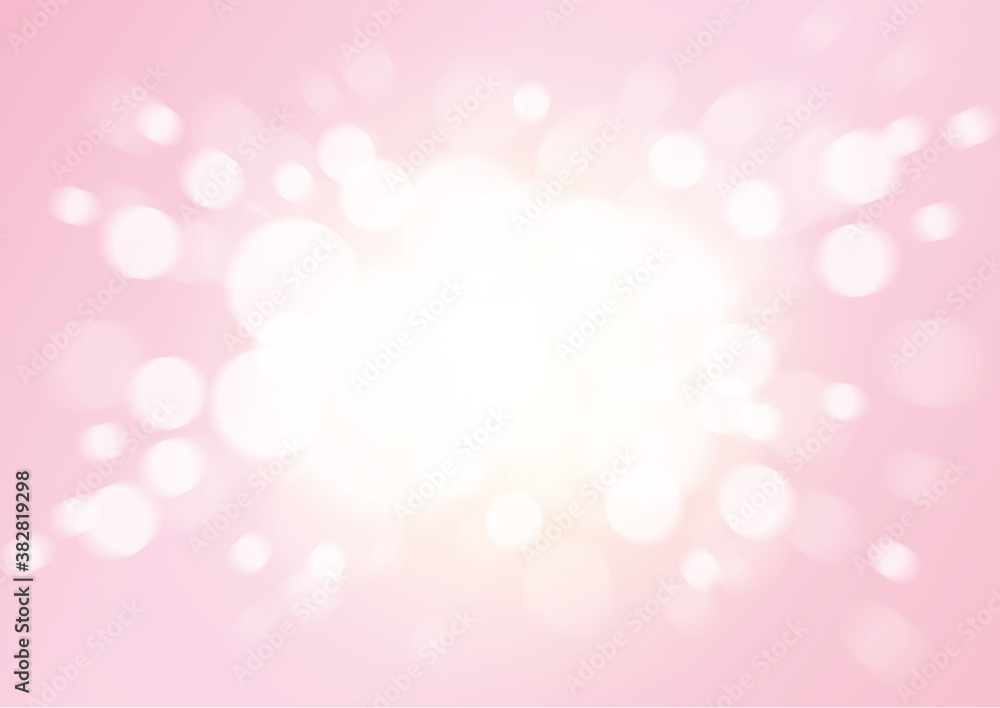 優しい中心から飛び散る光輝く背景玉ボケ　ピンク