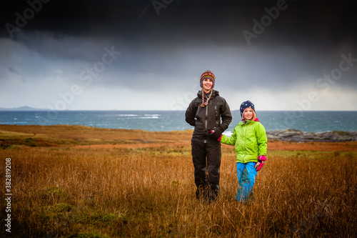 Mother and Daughter Outdoor Portrait in Stormy Weather