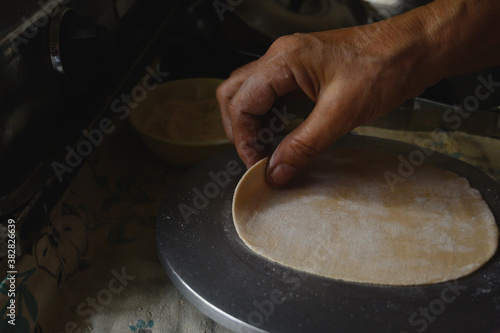 A roti being cooked in an Indian Household