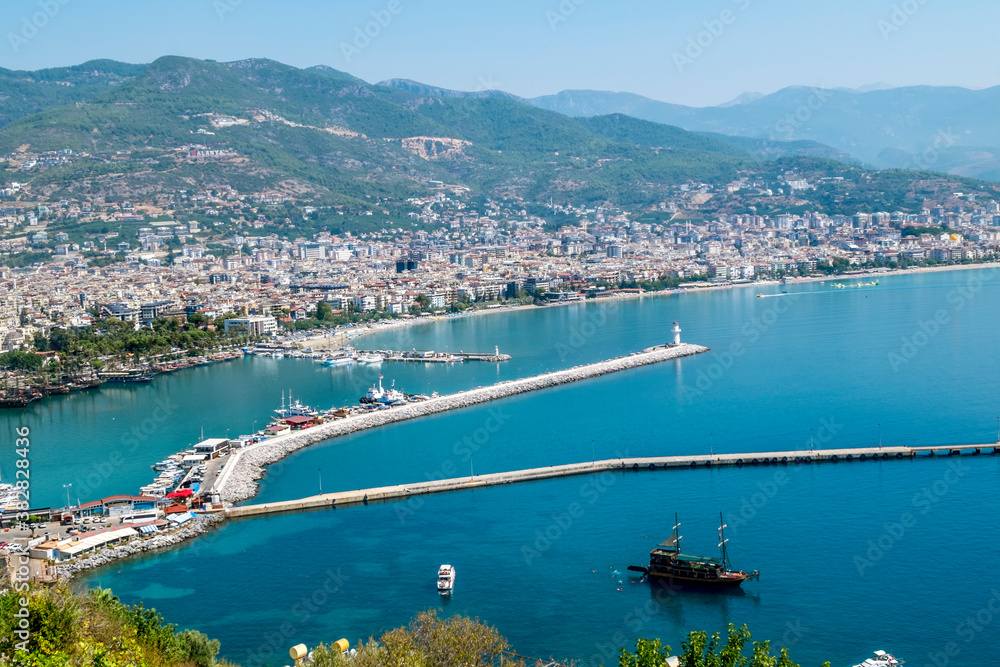 View of the walls of the ancient fortress and the harbor  in Alanya in Turkey