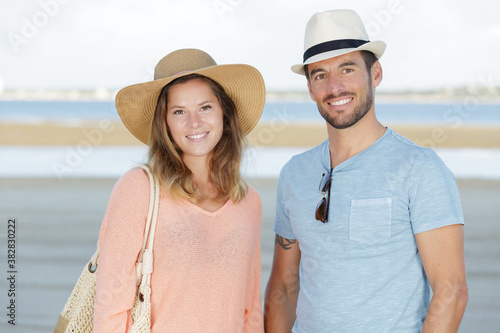portrait of attractive couple at the coast © auremar