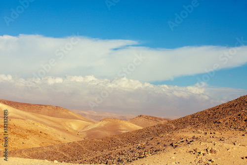 Mountainous desert with cloudy sky. Judean desert in Israel