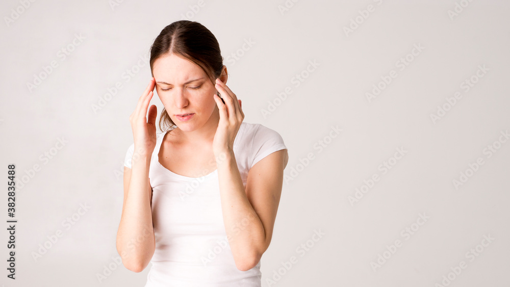Young beautiful woman having headache Young beautiful woman having headache