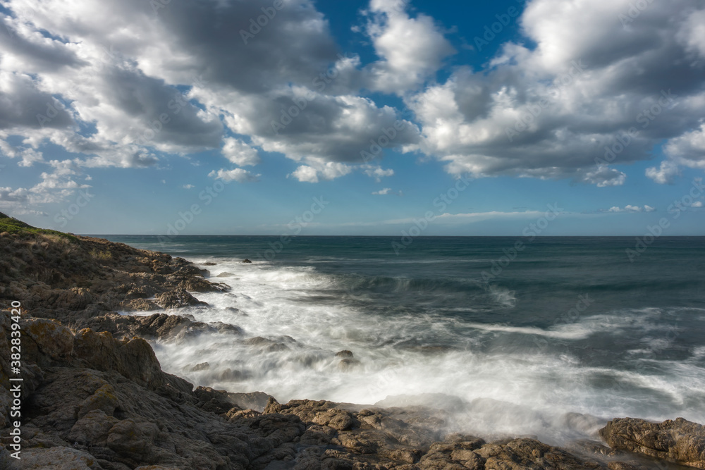 Waves washing onto rocks at Losari in Corsica