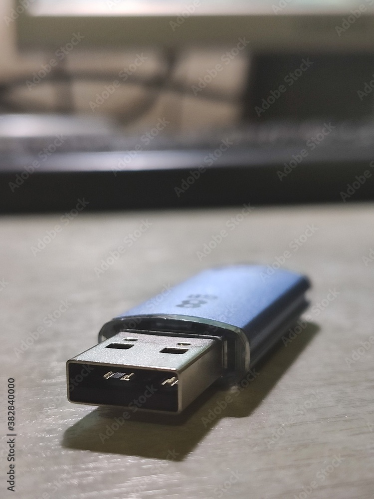 8 GB blue flash on the table, front view 8 GB blue flash on the table, front view