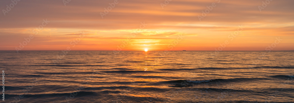 Panoramic sunrise over the ocean