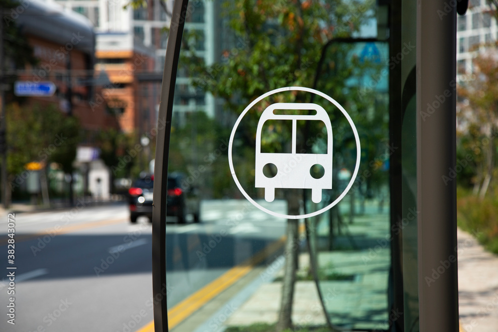 Glass bus stop and logo